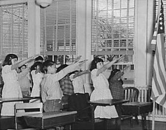 school children saluting the flag