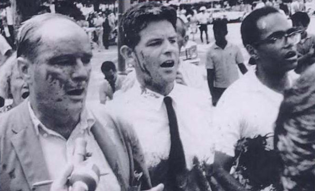 Dave Dellinger, Staughton Lynd, and Robert Moses at a protest against the Vietnam War in Washington, D.C. in August 1965. From the book "Direct Action: Radical Pacifism from the Union Eight to the Chicago Seven."
