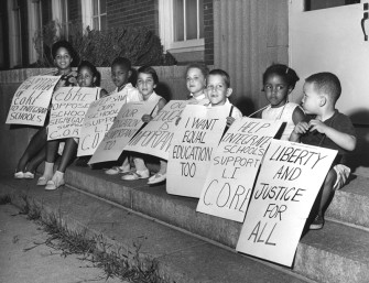 Textbooks seldom depict institutionalized racism and resistance in the North. Photo: Children picket high school in 1962 in Long Island, NY. (c) Newsday, Inc