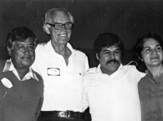 Fred Ross Sr. (second from left) with Cesar Chavez (left), Luis Valdez (second from right) and Dolores Huerta (right), late 1980s. Photo: Walter P. Reuther Library,  Wayne State University.