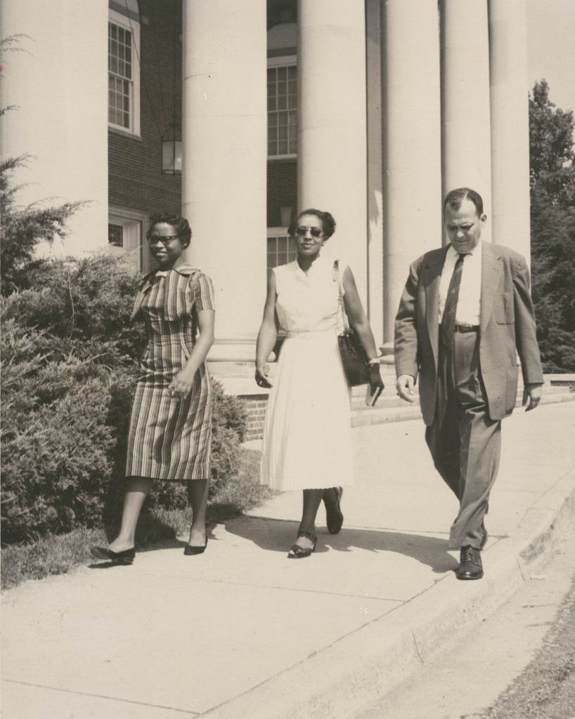 Velma Hopkins, center, became involved in the Civil Rights Movement. Here she is escorting the first black student to the newly desegregated R. J. Reynolds High School in North Carolina. Image: Digital Forsyth.
