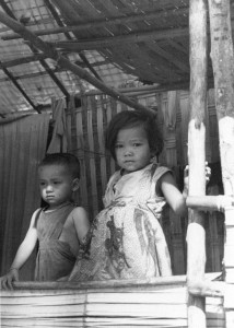 Nang Khamphounta, the mother of these children described how the children's father, Thit Boun Thong, was killed by "big bombs" from a T-28 aircraft in August 1969. "Thit Boun Thong had been working in the rice field and did not reach the holes in time when the planes came over. He was killed. There were no soldiers around when the planes bombed. I can't remember how many times the planes came over in a day because when they came over I was very frightened. Every time I heard the sound of a plane I fled for the holes."
