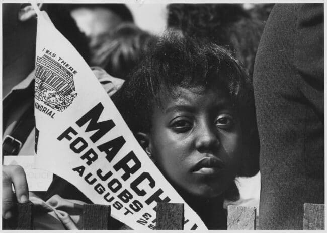 Photograph of a Young Woman at the Civil Rights March on Washington, D.C. with a Banner, 08/28/1963