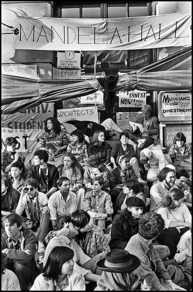 Photograph of students blockading Hamilton Hall at Columbia University demanding the university divest from companies doing business in South Africa.
