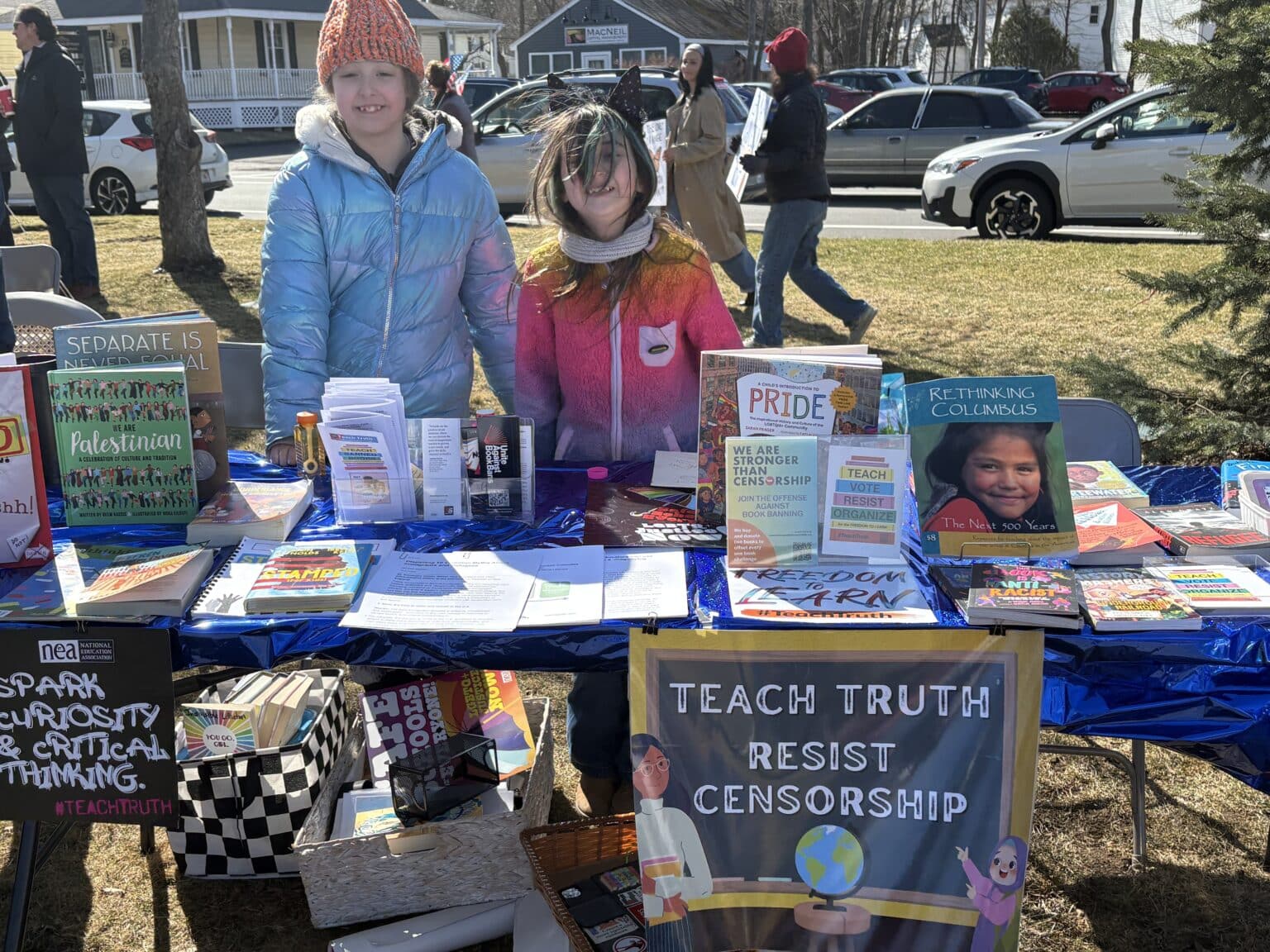 children at table with teach truth materials